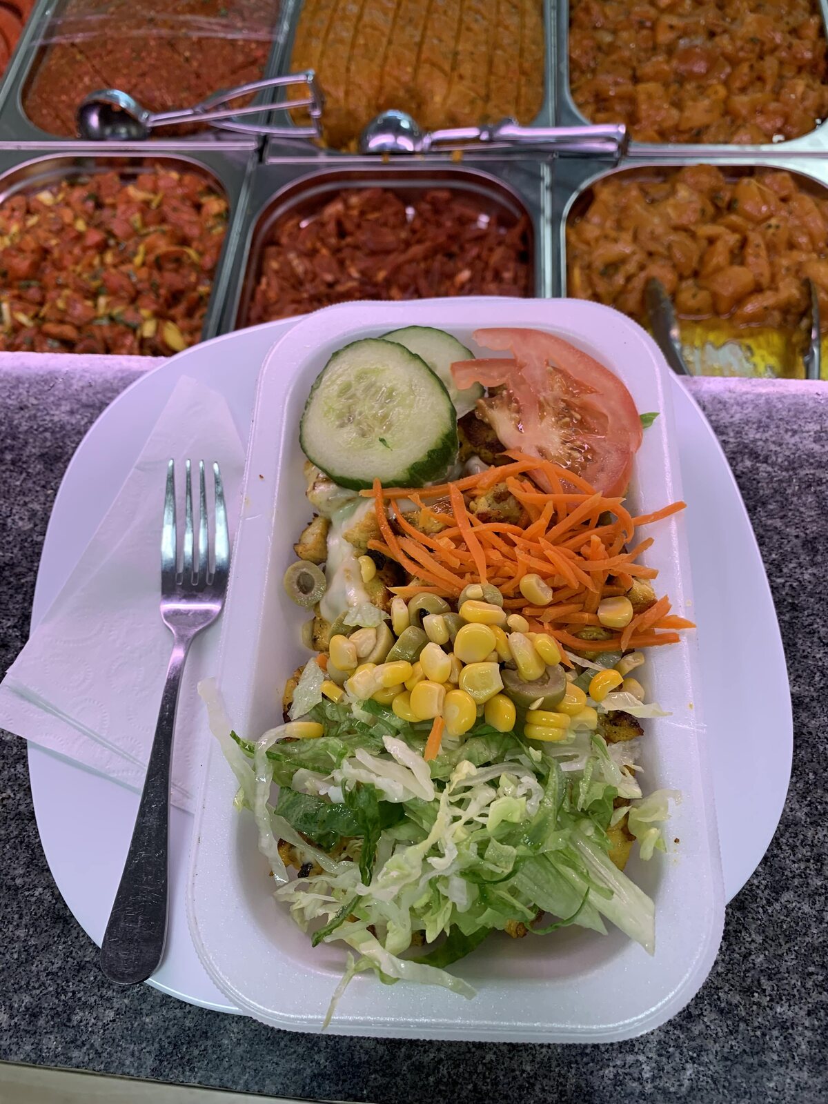 Kapsalon van Al Madina, vers van de grill